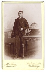 Photograph M. Jung, Lichtenstein, Schulgasse 175, Young Boy in Black A