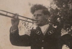 Great old photo man from the music corps with long trumpet? 1930s-40s