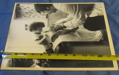 1977 Sandy Underwood photograph; doctor examining child #2, 11″ x 14″