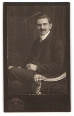 Photograph Hermann Tietz, Munich, Bahnhofplatz, elegant portrait of a gentleman