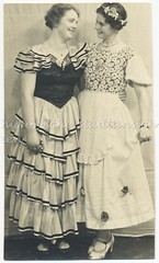 2 Women with Floral Decorations in Hair and Dress – Vintage Photo 1930s
