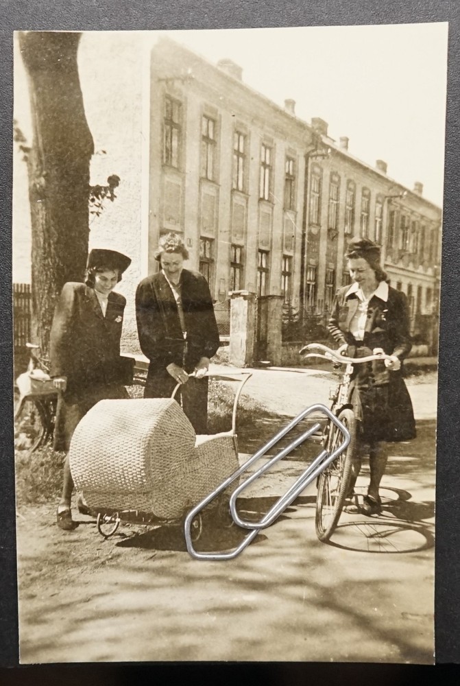 Photo portrait young women Berlin view residential building pram bicycle model old