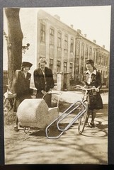 Photo portrait young women Berlin view residential building pram bicycle model old