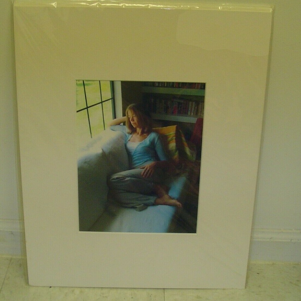 MATTED PHOTOGRAPHY Woman sitting on couch by Larry Santucci 16×20