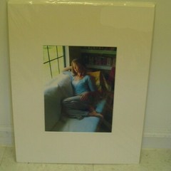 MATTED PHOTOGRAPHY Woman sitting on couch by Larry Santucci 16×20
