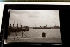 Great old negative – port unknown to me – tug fair play??