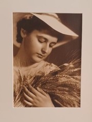 Nelly’s Photo Portrait of a Women Holding a Sheaf of Wheat C. 1930-40