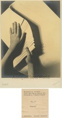 Hands with paper antique abstract art photo by Russell S. Kramer