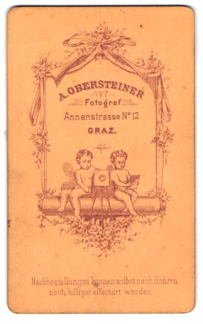 Photograph A. Obersteiner, Graz, Annenstraße 12, two children with a plate box