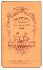 Photograph A. Obersteiner, Graz, Annenstraße 12, two children with a plate box