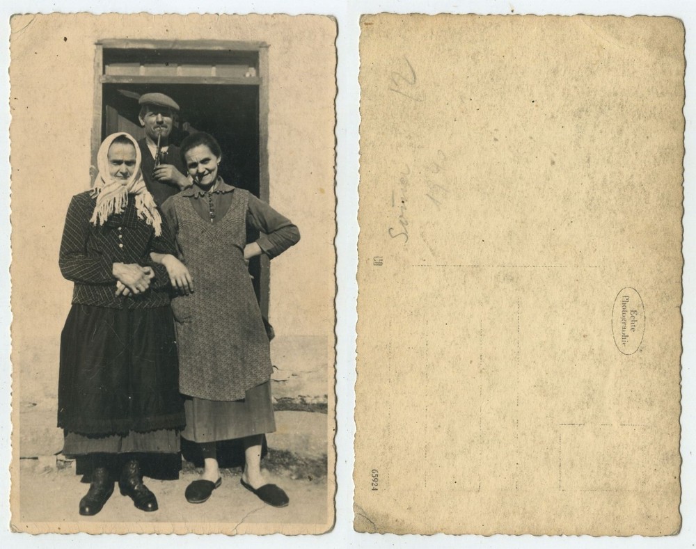 64458 – Farmer with Two Women on Front Door – Photo, Dated Summer 1940