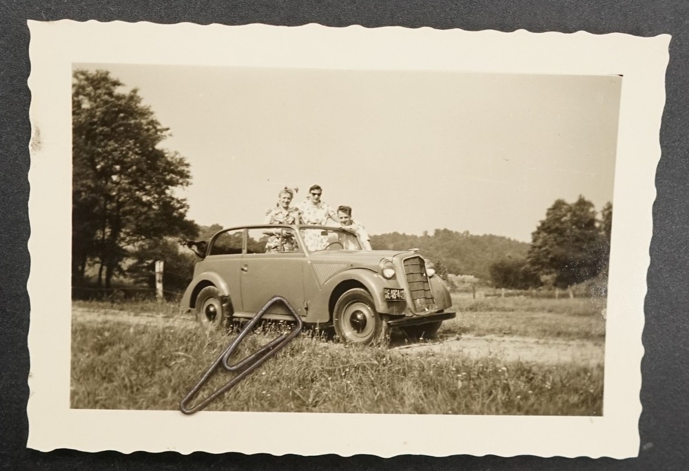Photo view Opel Olympia car portrait women license plate BR small car motor vehicle