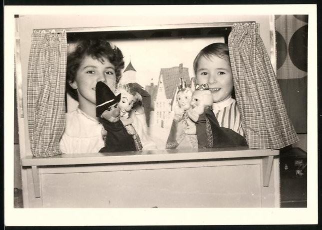 Photography Kids Playing Puppet Theatre With Hand Puppets
