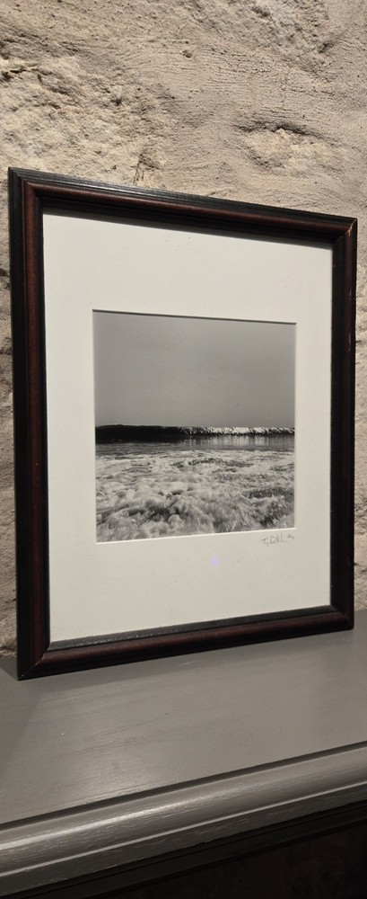 Framed Black and white Photograph of an Ocean Wave By Ty Dikhoff created in 1999