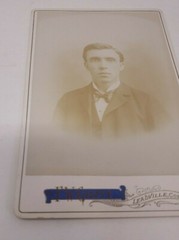 Antique Cabinet Card Photograph- Nicely dressed man in a suit taking a headshot