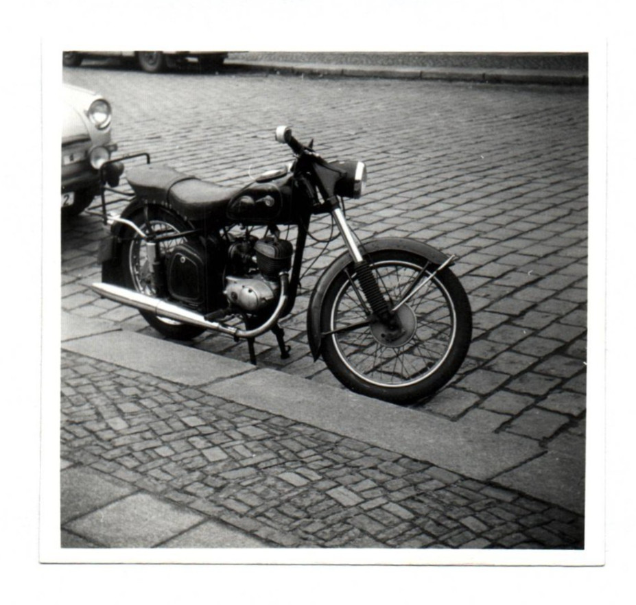 Photo old MZ motorcycle on the road GDR vintage motorcycle old photograph