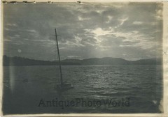 Sail boat in sunset sublime antique photo