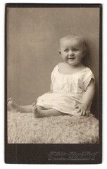 Photograph Herm. Bähr, Dresden, Antonstraße 2, baby in white on animal fur