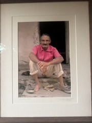 A signed photographic portrait of a man in Trinidad, Cuba. By David Simchock