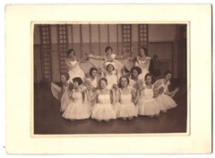 Photograph young ballet Elevin in tutus at a choreography