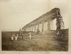 Horsemen by aqueduct bridge ruins antique photo