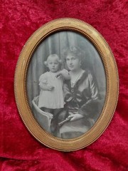 D-197. Antique Framed Photograph. Oval Golden Frame. 19th Century