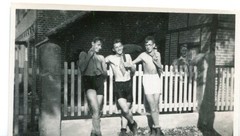 Old photo 1930s boys at garden fence, 9x6cm