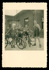Boys standing 1943 with bicycle in front of station – 1940s – Photo 6x9cm