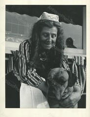 Old woman in ethnic dress w dog art photo by Levinsohn