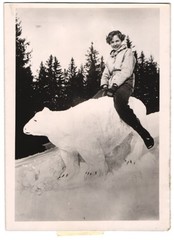 Photograph young woman sitting on polar bear from snow 1940