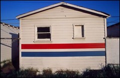 PAINTED STRIPES ON BUNGALOW CELEBRATING AMERICA’S BICENTENNIAL 1976