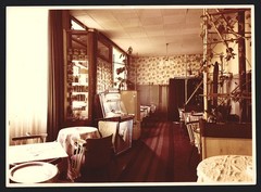 Photography Cafe Interior with Rock-Ola 200 Disc Game Box, Music Box / Jukeb