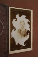 Great old photo on cardboard portrait of a woman photo montage?