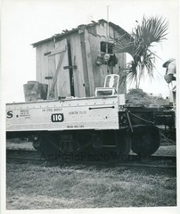 Train carrying barn with clown vintage circus photo