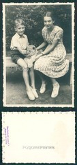 Photo braids girl with lion baby zoo Berlin cute pigtail girl Lion cub photo