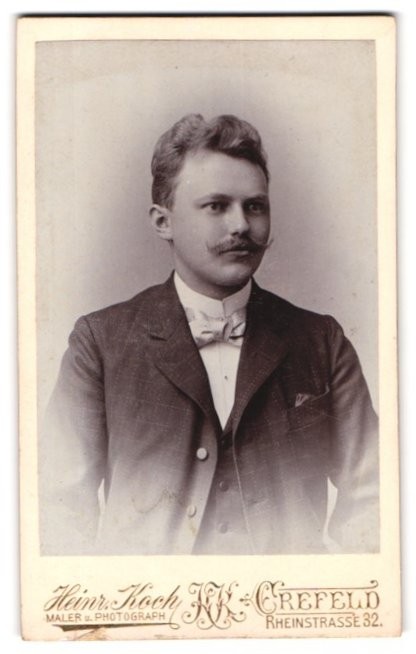 Photograph Heinr. Koch, Crefeld, Rheinstrasse 32, portrait young man in suit