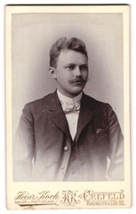 Photograph Heinr. Koch, Crefeld, Rheinstrasse 32, portrait young man in suit