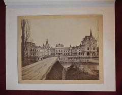 Vintage Black and White Photograph of a Large Building with a Courtyard