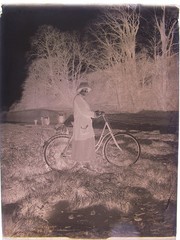 Bicycle driver woman with bicycle historical glass negative around 1920