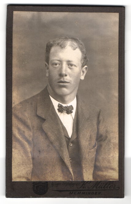 Photograph Karl Müller, Memmingen, in front of the Ulm Gate, man with suit and Schlei