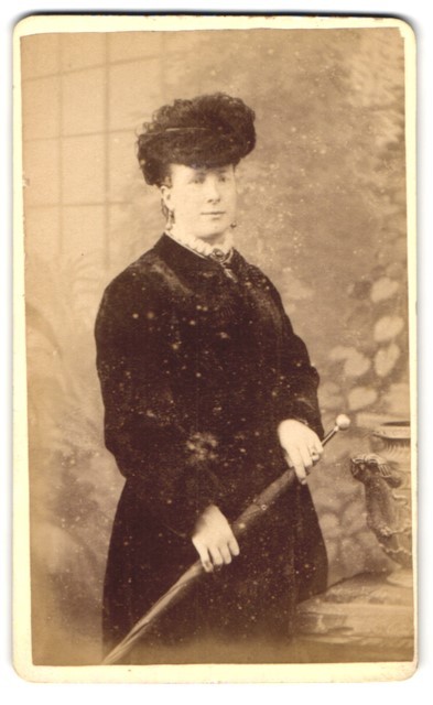 Photograph Owen Angel, Exeter, 11 High Street, Lady with Hat and Umbrella