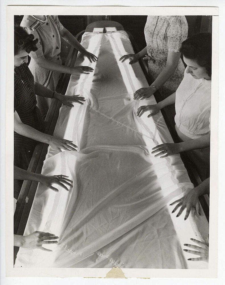 Modernist WW2 Press Photograph of Women Testing Parachutes for Flaws with Light