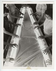 Modernist WW2 Press Photograph of Women Testing Parachutes for Flaws with Light