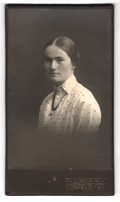 Photography J. Grimm, Offenburg, elegant lady in polka dot blouse