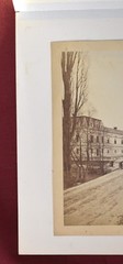 Vintage Black and White Photograph of a Large Building with a Courtyard