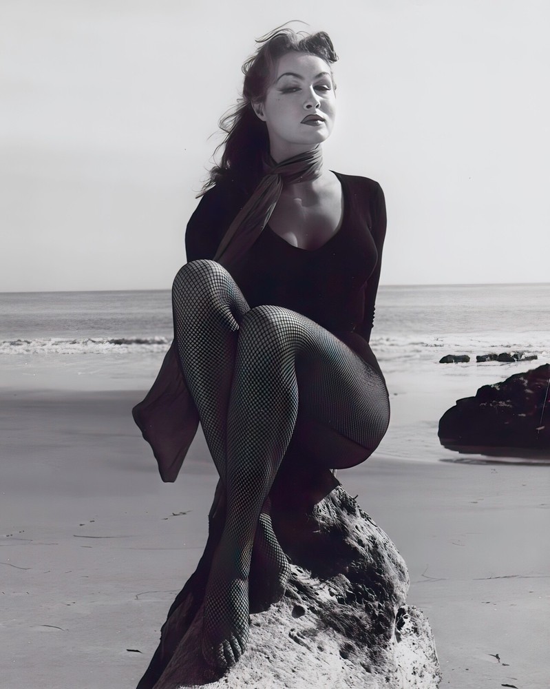 Julie Newmar on the beach c. 1959, reprint/poster – multiple sizes: 1363