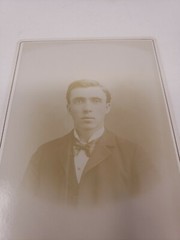 Antique Cabinet Card Photograph- Nicely dressed man in a suit taking a headshot