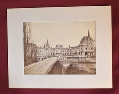 Vintage Black and White Photograph of a Large Building with a Courtyard