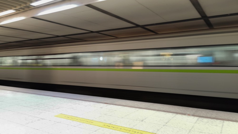 An underground train departing from the station