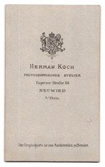 Photograph Hermann Koch, Neuwied a. Rh., young woman in dress with hood and chin